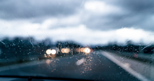 A common cause of auto collisions - the view looking out blurry windshield during storm
